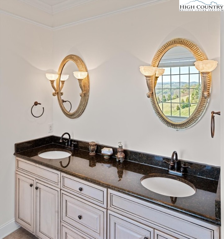 368 Fox Run Lane Sparta, NC 28675 - Photo 21 of 50 a bathroom with a sink and a mirror