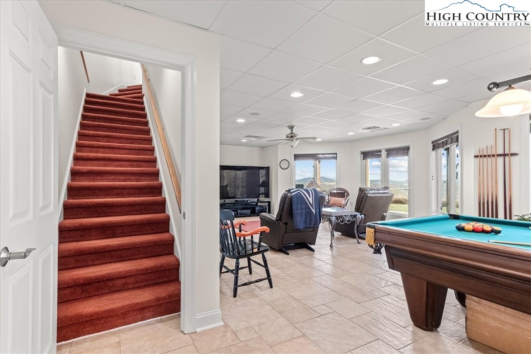 368 Fox Run Lane Sparta, NC 28675 - Photo 27 of 50 a living room with furniture a dining table and chairs