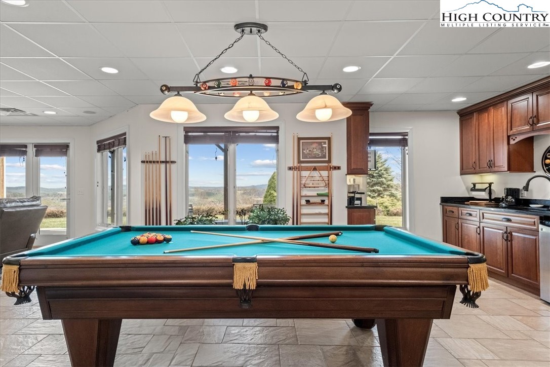 368 Fox Run Lane Sparta, NC 28675 - Photo 28 of 50 a room with pool table and windows