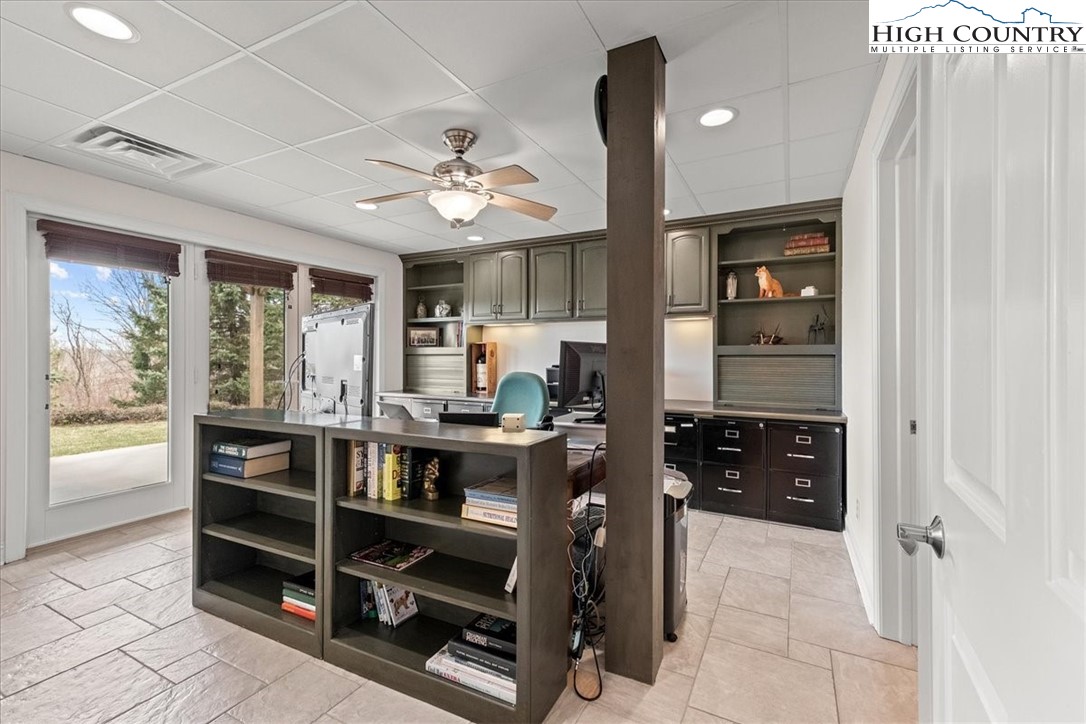 368 Fox Run Lane Sparta, NC 28675 - Photo 30 of 50 a view of a center island kitchen island furniture and windows