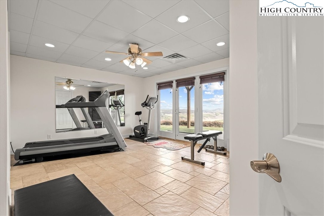 368 Fox Run Lane Sparta, NC 28675 - Photo 36 of 50 a view of a room with gym equipment