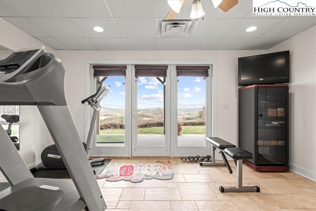 368 Fox Run Lane Sparta, NC 28675 - Photo 37 of 50 a living room with furniture and a flat screen tv