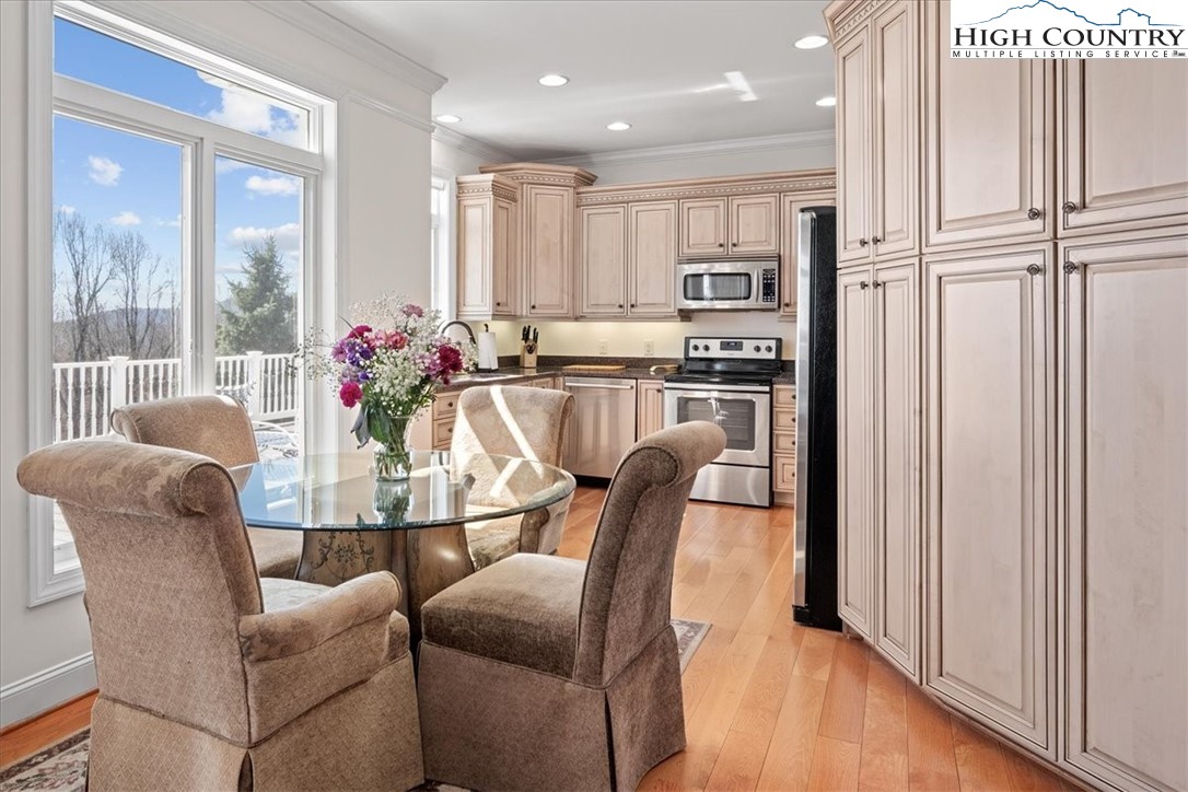 368 Fox Run Lane Sparta, NC 28675 - Photo 4 of 50 a view of a dining room with furniture window and outside view