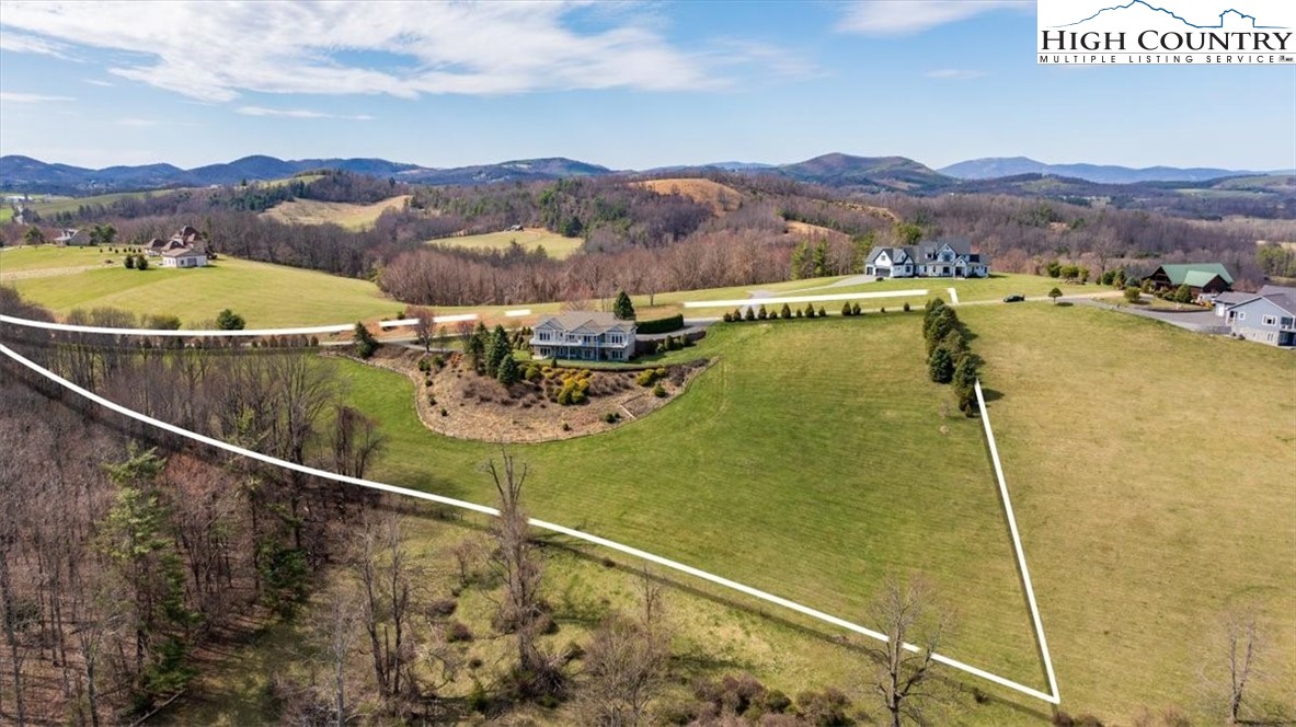 368 Fox Run Lane Sparta, NC 28675 - Photo 41 of 50 a view of a swimming pool with a chandelier
