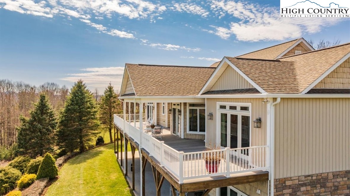 368 Fox Run Lane Sparta, NC 28675 - Photo 44 of 50 a view of a house with backyard and deck