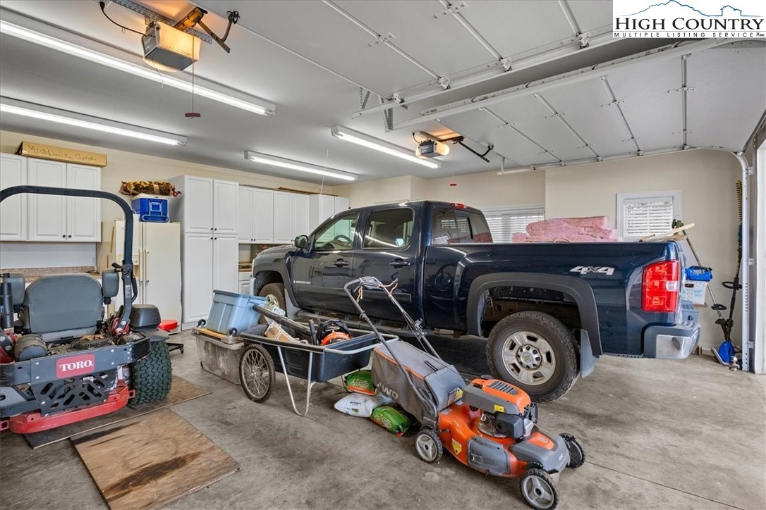 368 Fox Run Lane Sparta, NC 28675 - Photo 48 of 50 a car is parked in a garage