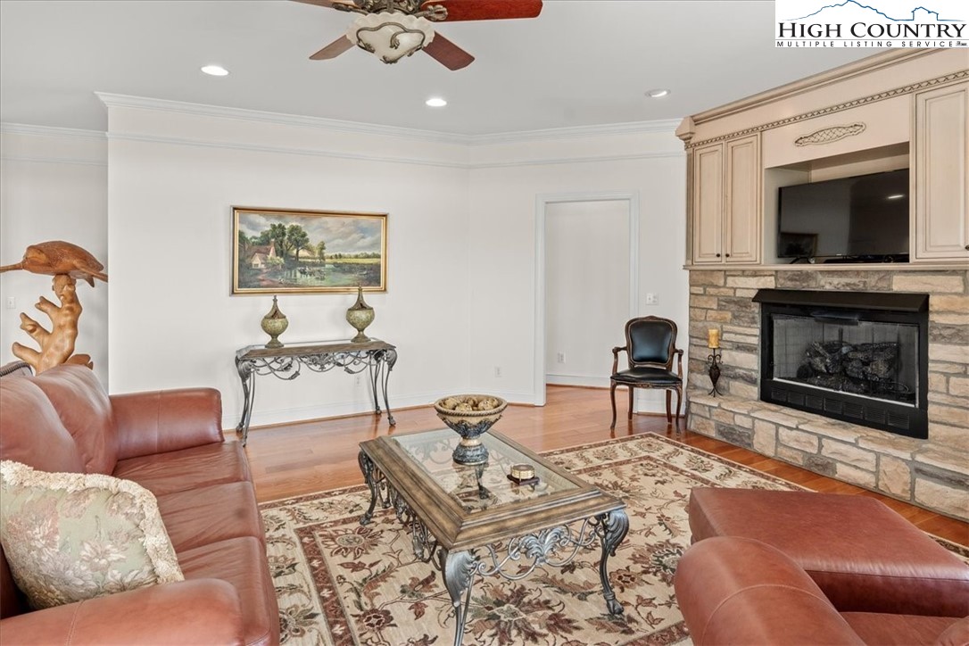 368 Fox Run Lane Sparta, NC 28675 - Photo 10 of 50 a living room with furniture and a fireplace