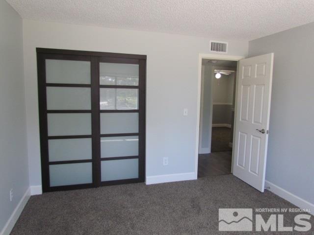 1855 Prior Reno, NV 89503 - Photo 11 of 25 a view of an empty room with closet and a window