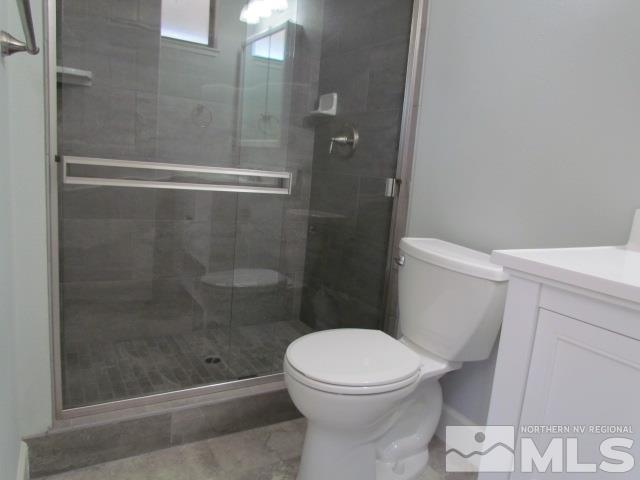 1855 Prior Reno, NV 89503 - Photo 12 of 25 a bathroom with a toilet and a shower