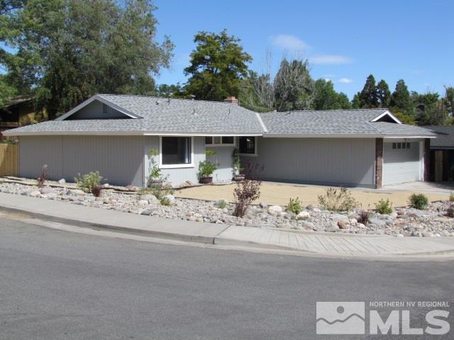 1855 Prior Reno, NV 89503 - Photo 2 of 25 a front view of a house with a yard