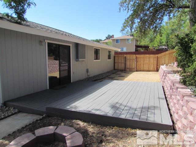 1855 Prior Reno, NV 89503 - Photo 21 of 25 a view of backyard with wooden floor and fence