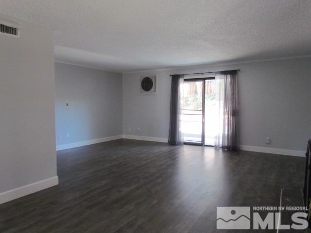 1855 Prior Reno, NV 89503 - Photo 3 of 25 a view of livingroom with hardwood floor and window