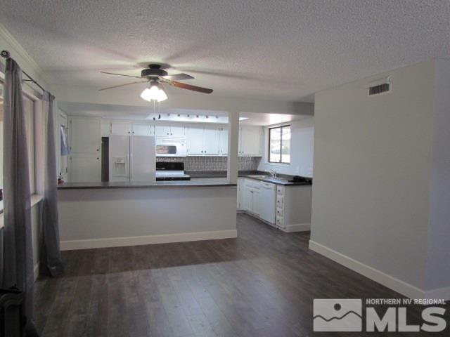 1855 Prior Reno, NV 89503 - Photo 4 of 25 a view of kitchen with cabinets and wooden floor