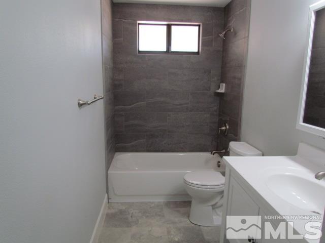 1855 Prior Reno, NV 89503 - Photo 8 of 25 a bathroom with a toilet a sink and bathtub