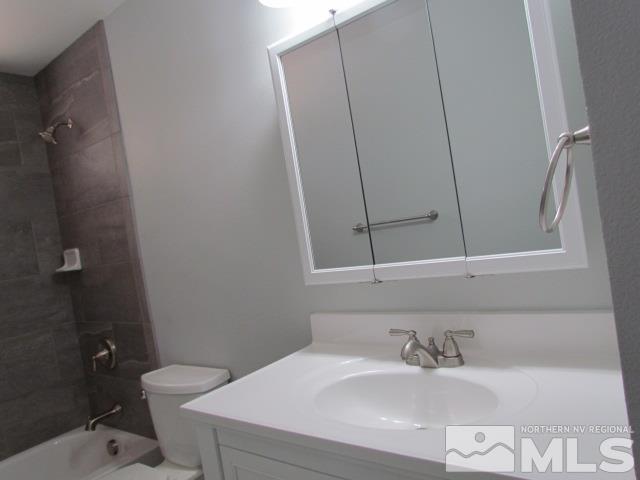 1855 Prior Reno, NV 89503 - Photo 9 of 25 a bathroom with a sink a toilet and shower
