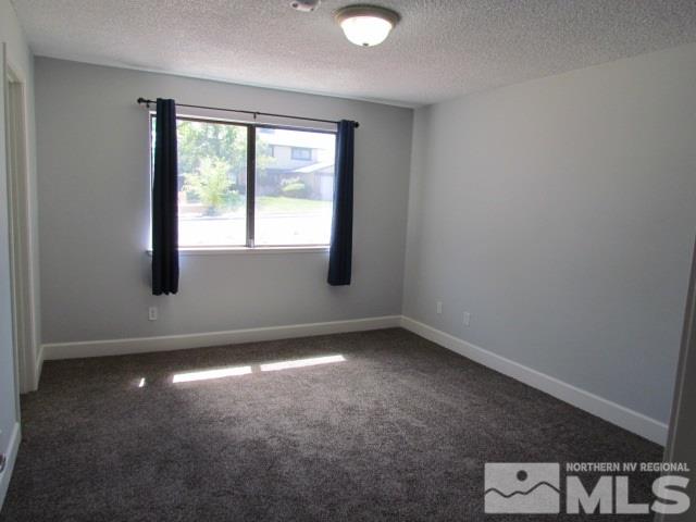 1855 Prior Reno, NV 89503 - Photo 10 of 25 an empty room with windows