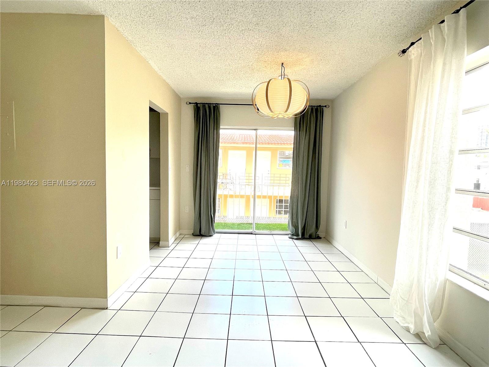 2138 Southwest 6th Street, Unit 201 Miami, FL 33135 - Photo 16 of 18 a view of an empty room and window