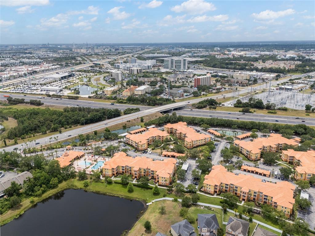 5447 Vineland Road, Unit 1308 Orlando, FL 32811 - Photo 25 of 31 an aerial view of a city
