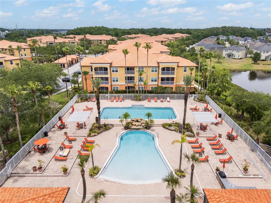 5447 Vineland Road, Unit 1308 Orlando, FL 32811 - Photo 27 of 31 an aerial view of a house with outdoor space