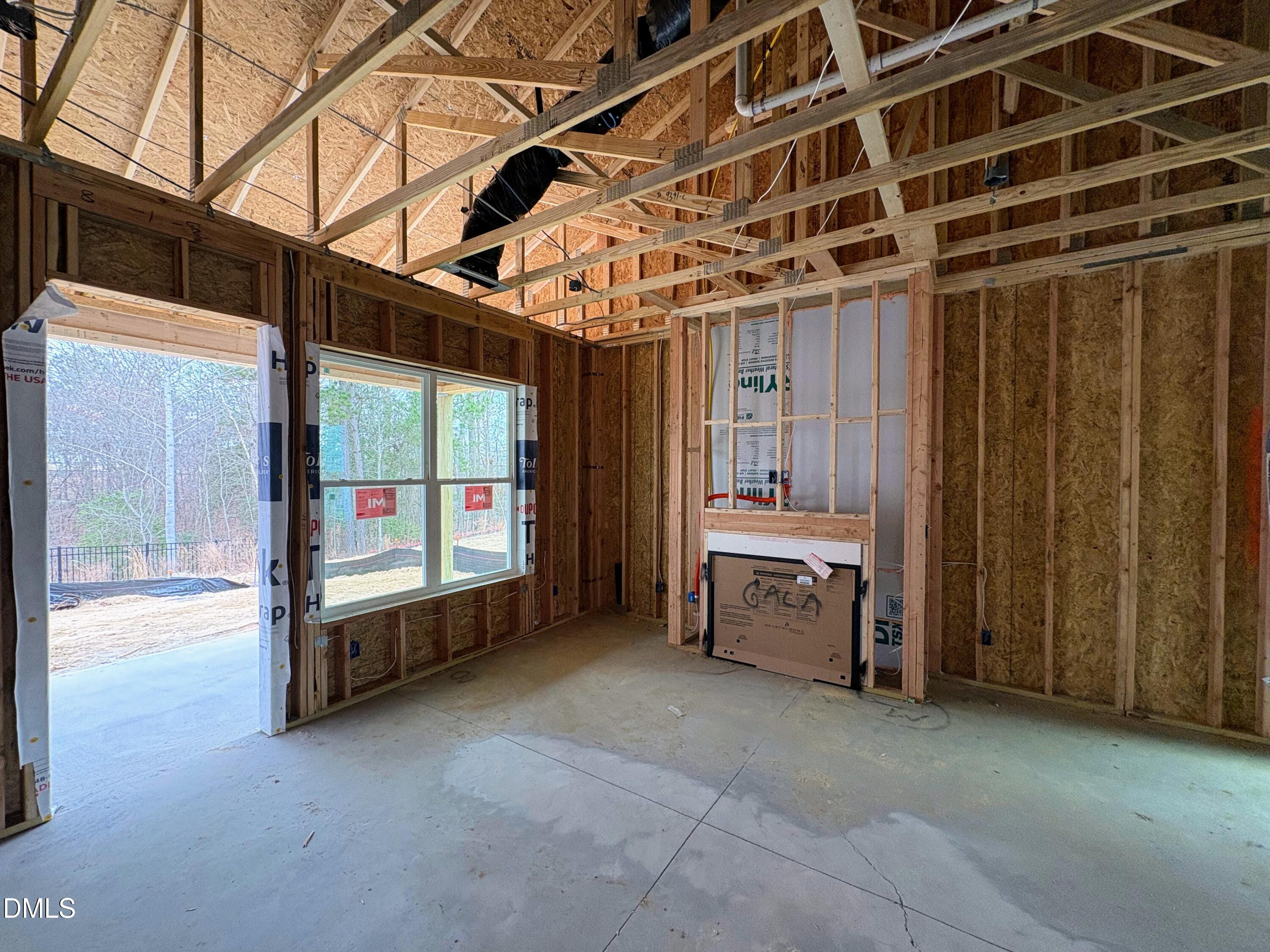 2424 Fleming Stone Lane, Unit 46 Raleigh, NC 27610 - Photo 4 of 27 a view of an empty room with a fireplace