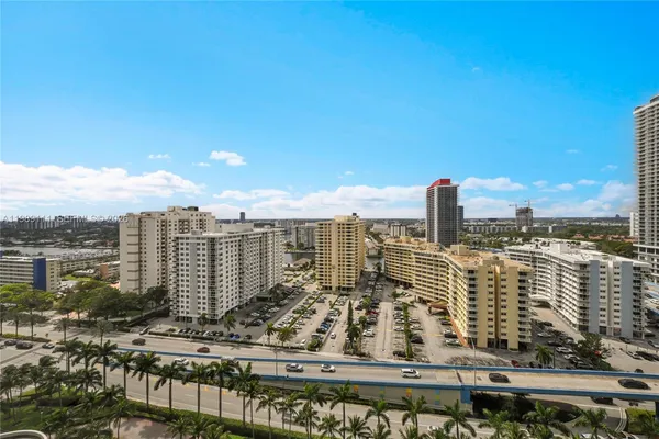 a view of a city with tall buildings