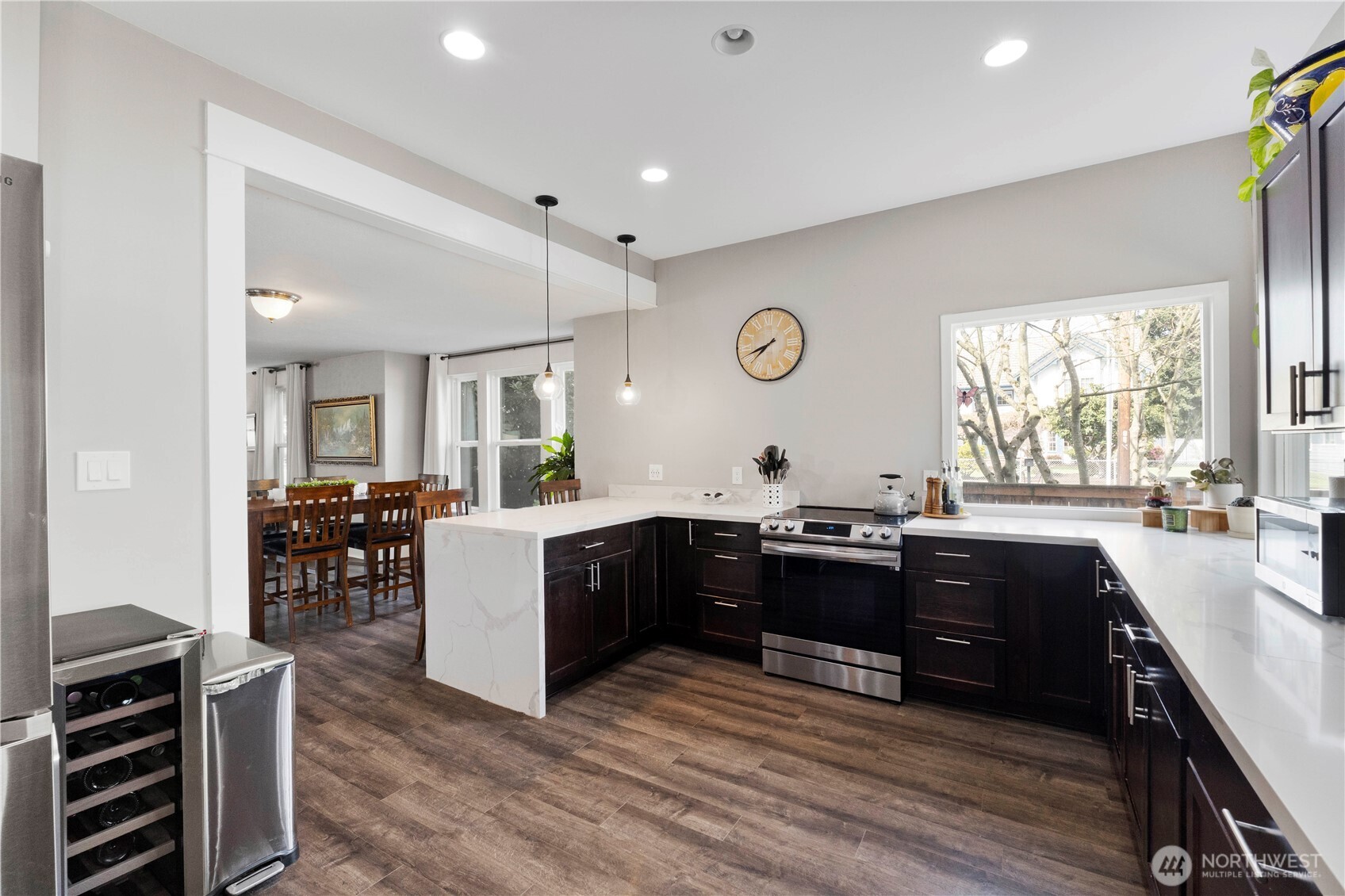425 Valley Avenue East Sumner, WA 98390 - Photo 14 of 34 a large kitchen with lots of counter top space