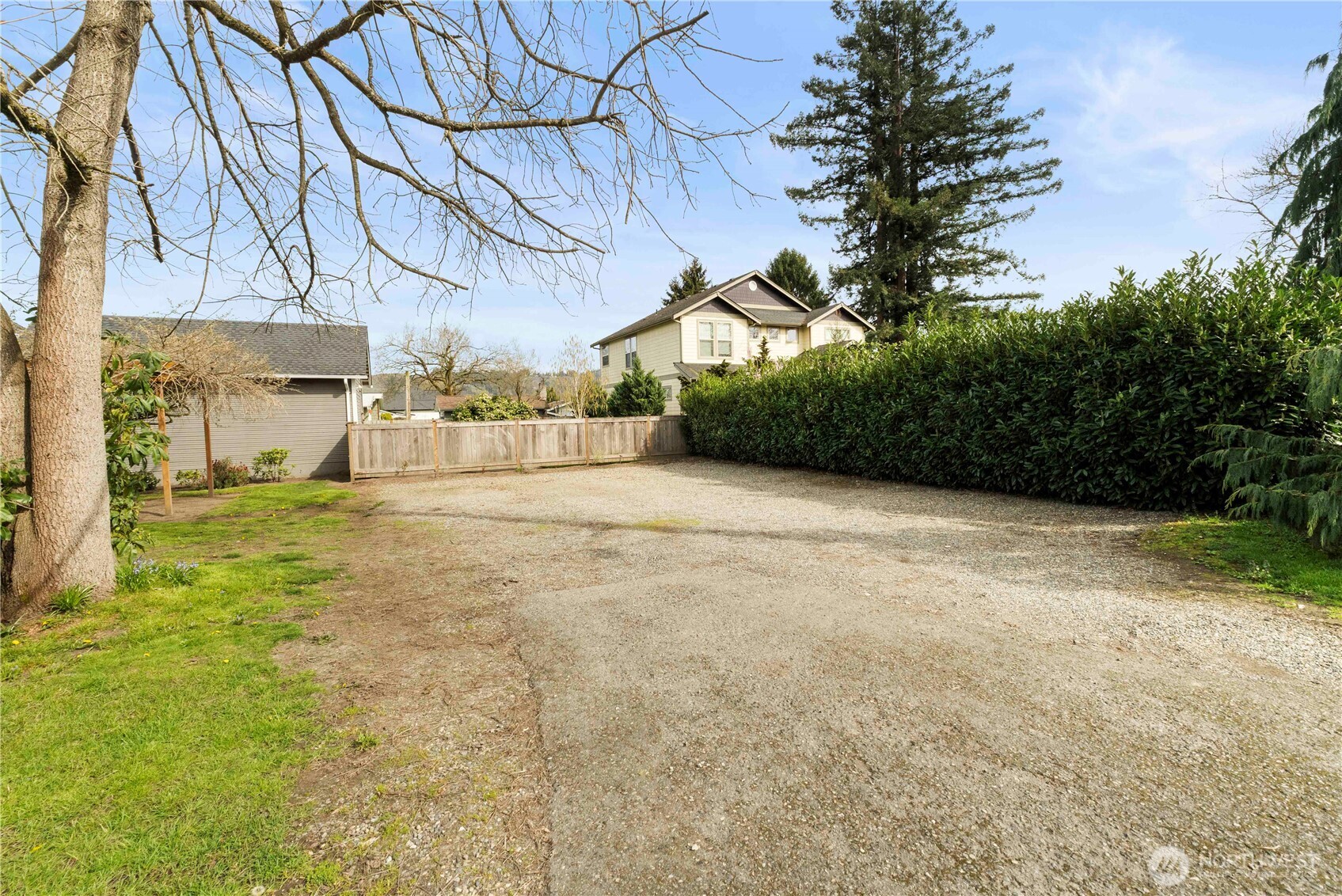 425 Valley Avenue East Sumner, WA 98390 - Photo 33 of 34 a view of a yard with a house