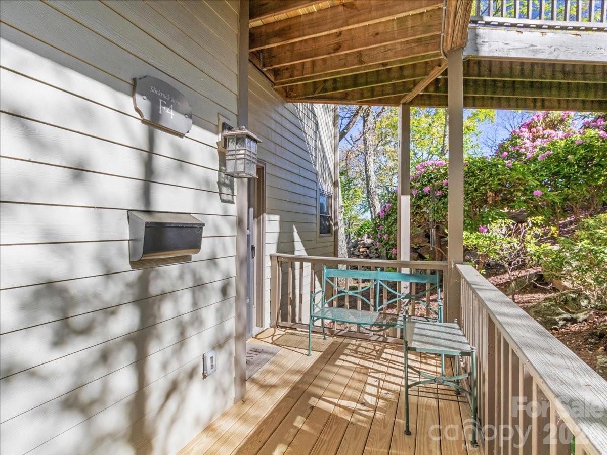 a view of balcony with wooden floor and outdoor space