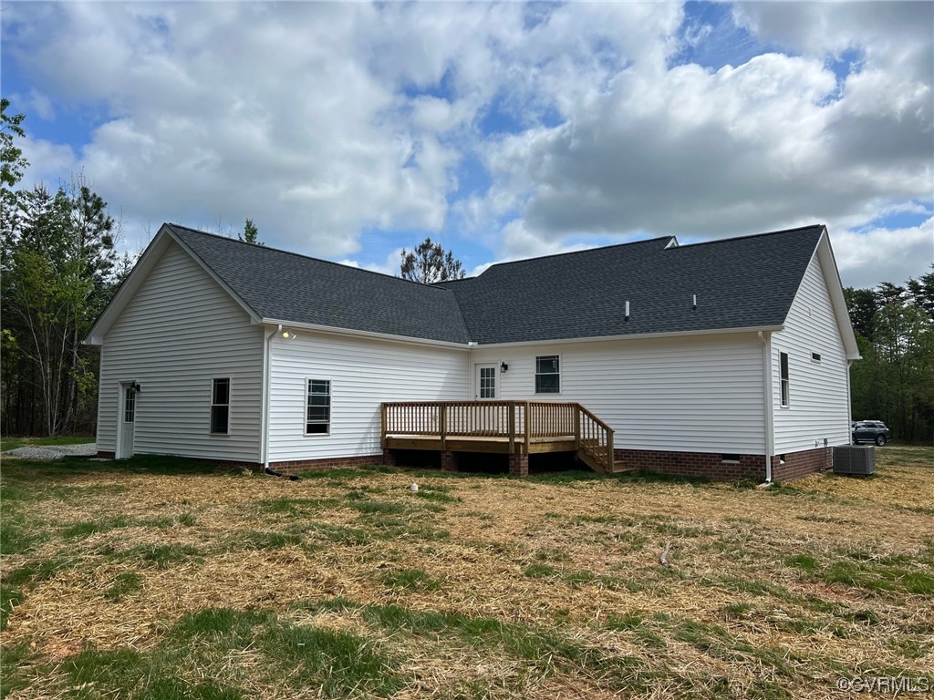 1072 Eastham Road Bumpass, VA 23024 - Photo 3 of 26 a house with yard in front of it