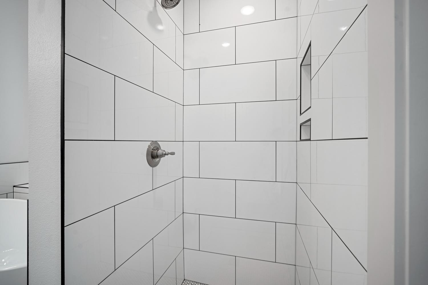 5902 Grinnell Street Lubbock, TX 79416 - Photo 16 of 26 a bathroom with a shower