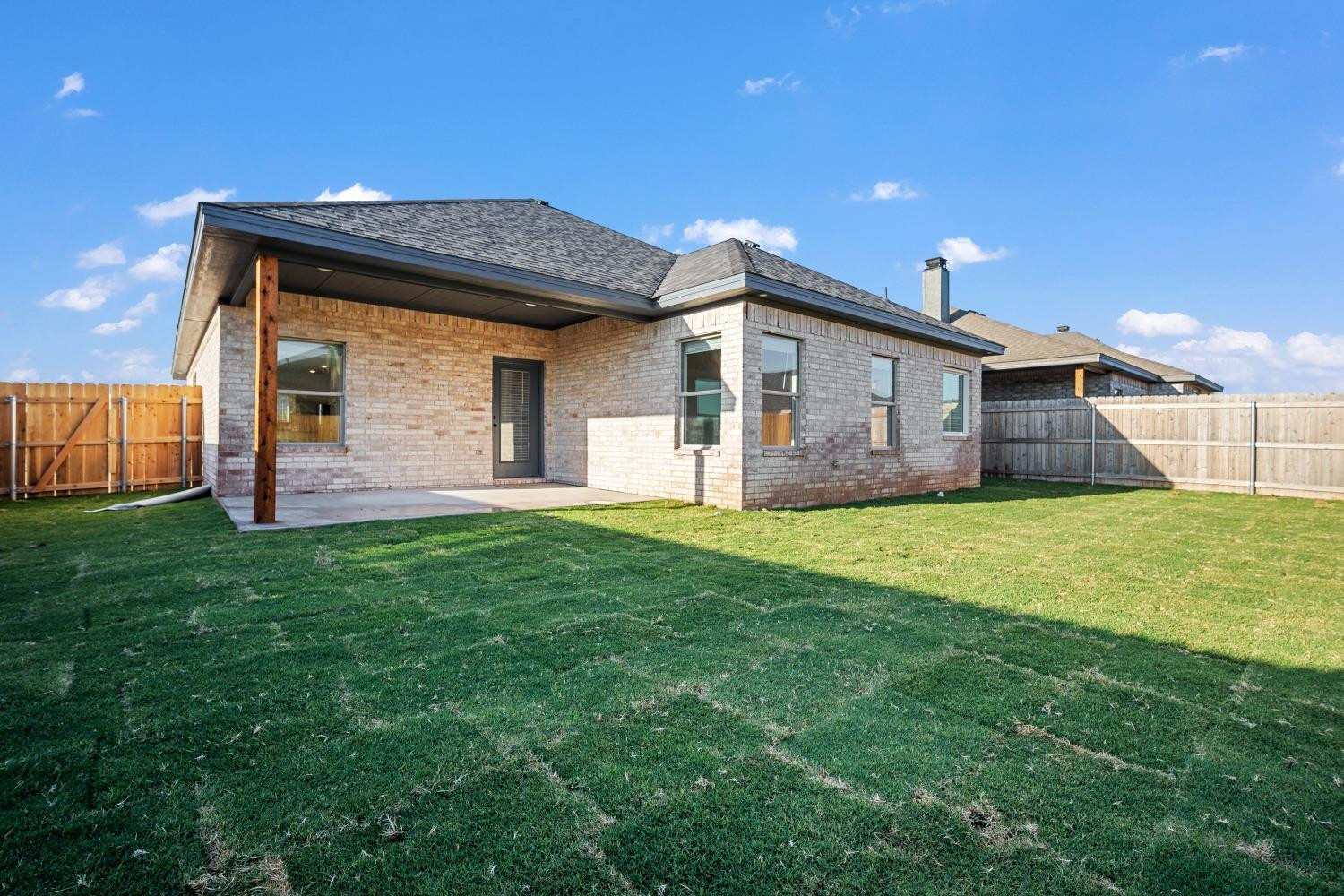 5902 Grinnell Street Lubbock, TX 79416 - Photo 26 of 26 a front view of a house with a yard
