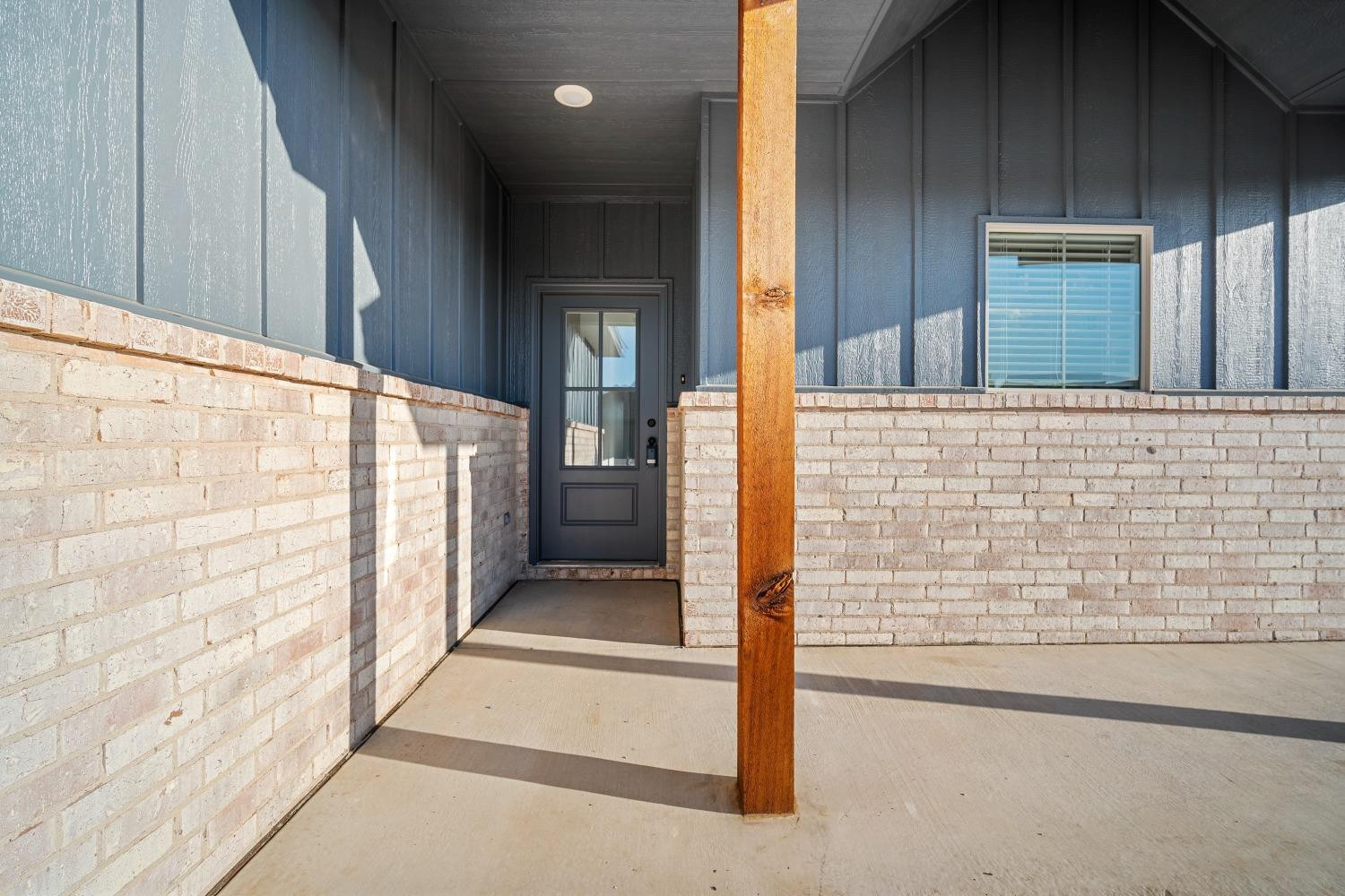 5902 Grinnell Street Lubbock, TX 79416 - Photo 3 of 26 a view of wooden door