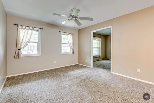 55 Sheffield Road Montgomery, IL 60538 - Photo 8 of 28 a view of an empty room with a window