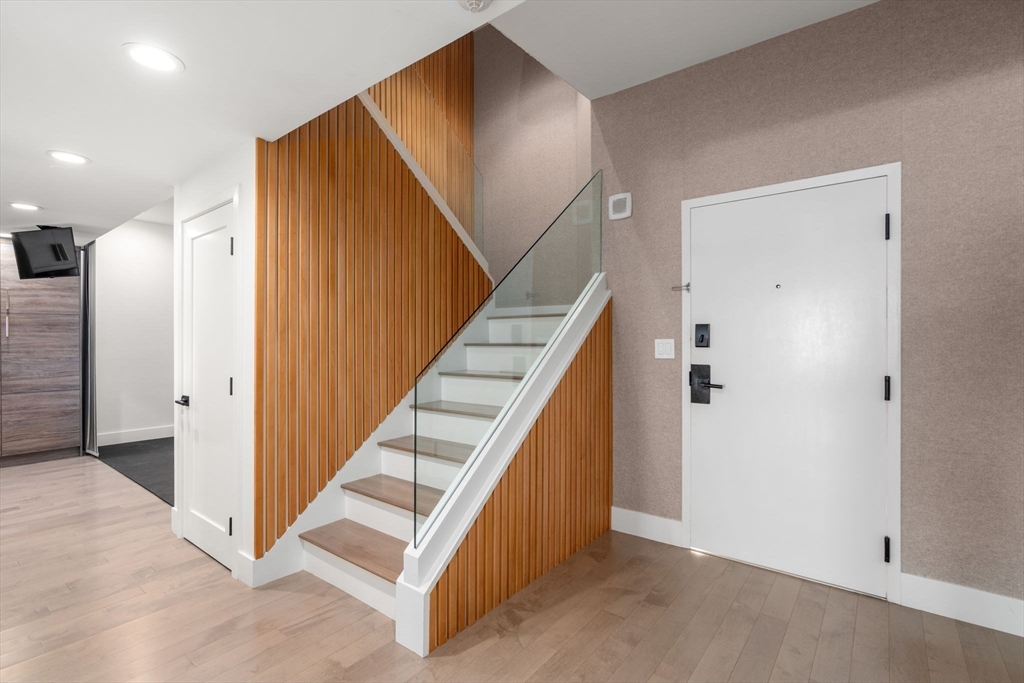 65 Lake Avenue, Unit 1003 Worcester, MA 01604 - Photo 23 of 38 a view of a hallway with entryway