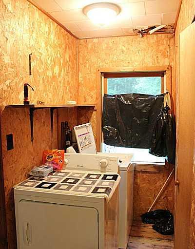 257 Jacob Buck Pond Road Bucksport, ME 04416 - Photo 14 of 15 Facade/Exterior Front. Laundry area,...