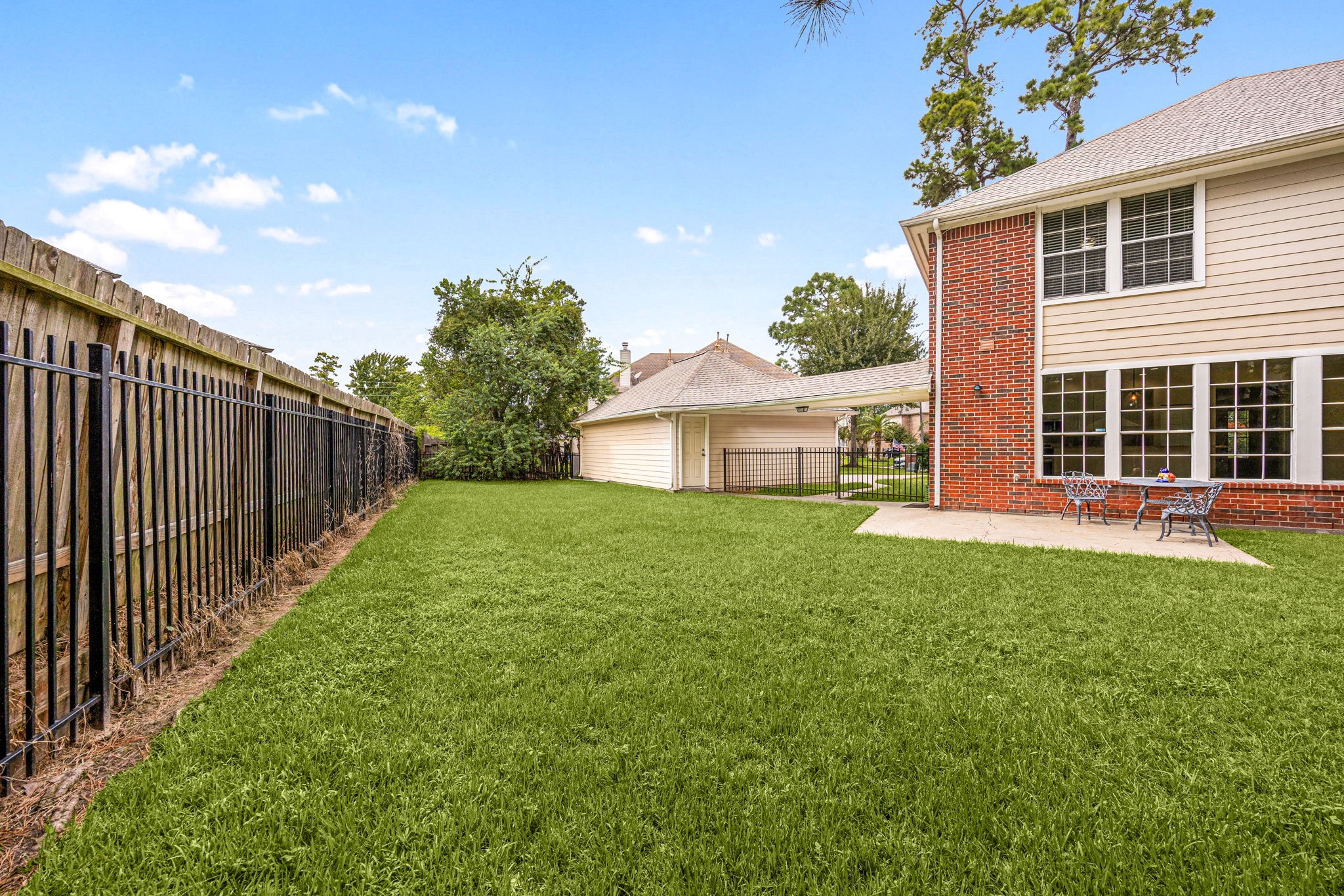 6335 Borg Breakpoint Drive Spring, TX 77379 - Photo 34 of 39 Spacious fenced backyard offering plenty of green space for outdoor activities and entertaining.