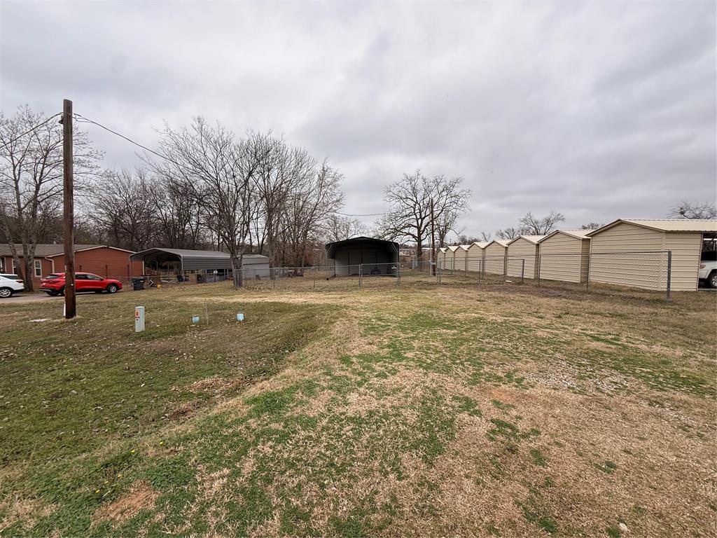 382 Broken Bow Quitman, TX 75783 - Photo 10 of 12 a view of a town with large trees