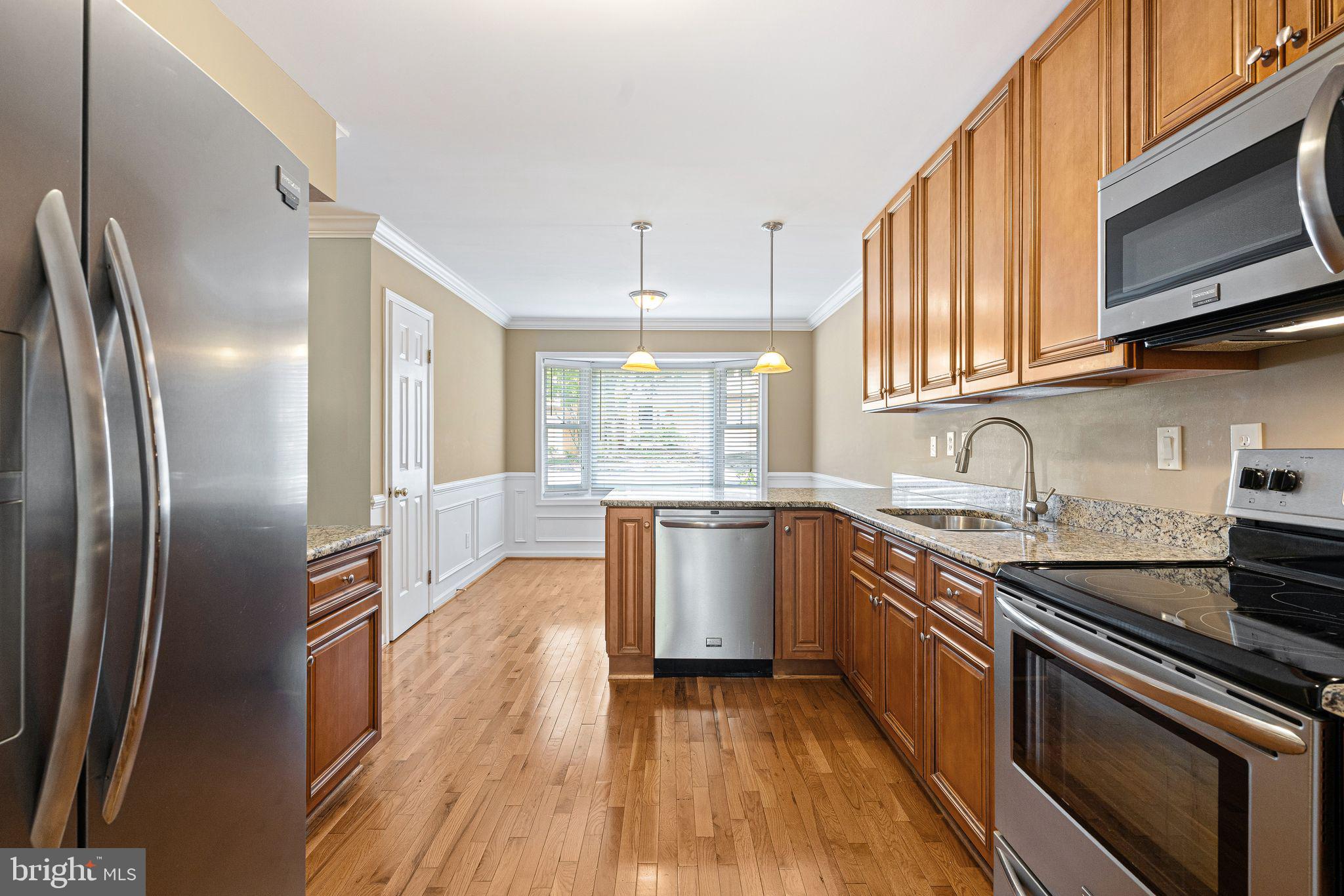 503 Brighton Road, Unit 5C Devon, PA 19333 - Photo 2 of 34 Kitchen w/Stainless Steel Appliances and Granite