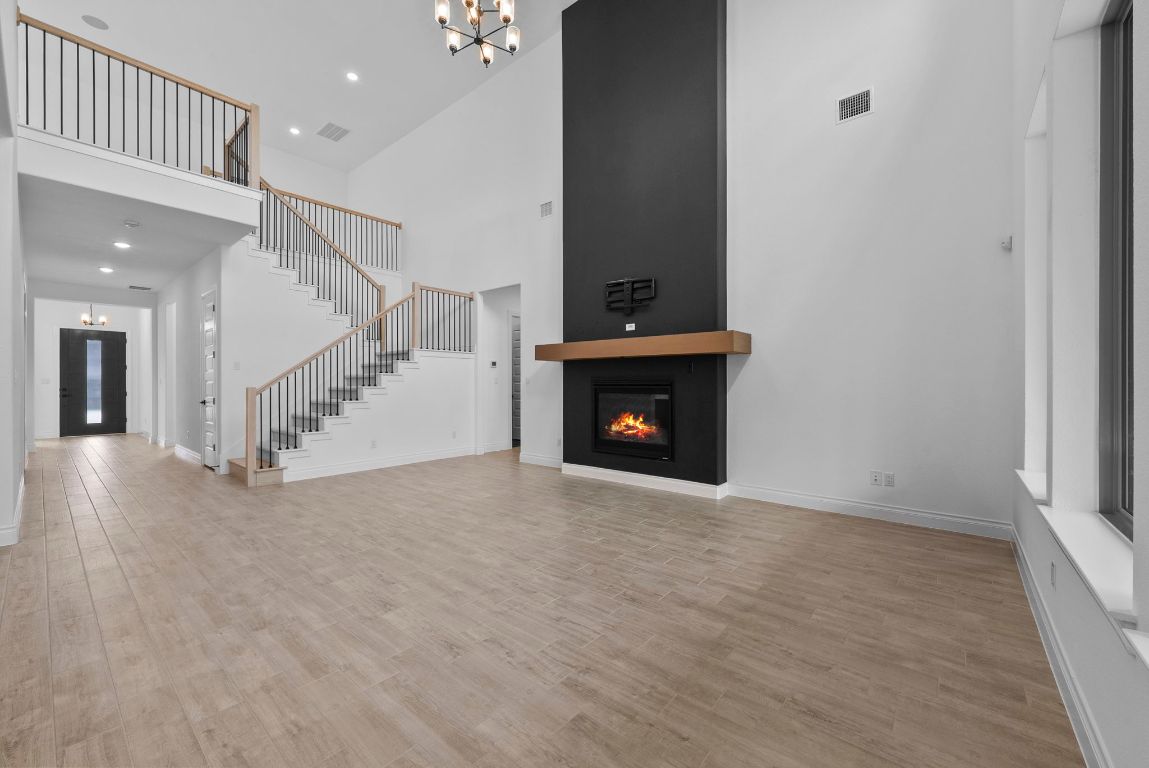 109 Strawberry Lane Georgetown, TX 78628 - Photo 15 of 40 a view of an empty room with a fireplace