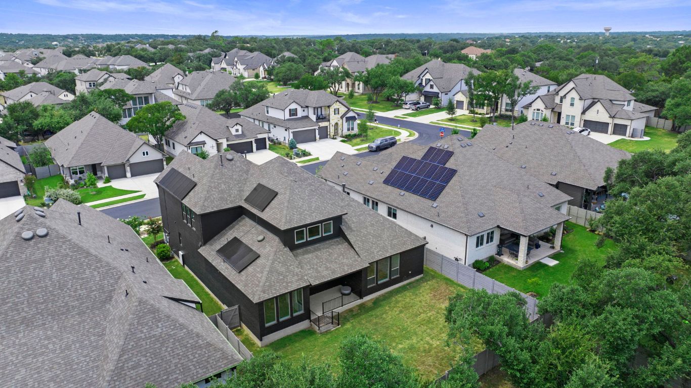 109 Strawberry Lane Georgetown, TX 78628 - Photo 38 of 40 an aerial view of a house with swimming pool and mountains