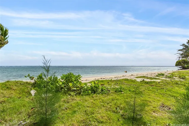 a view of a lake with a big yard