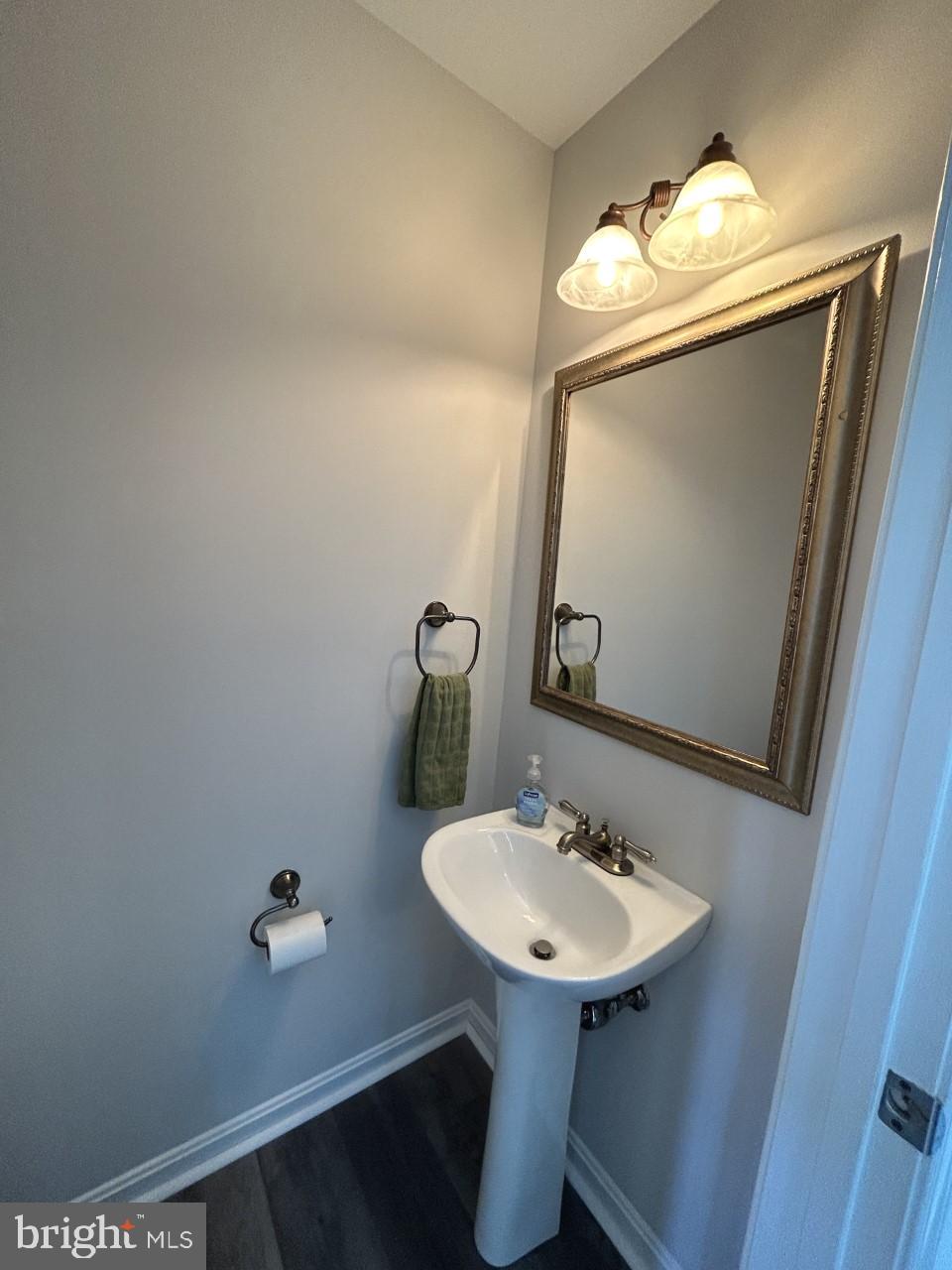 209 Quiet Ridge Court Pasadena, MD 21122 - Photo 16 of 32 Powder room main level