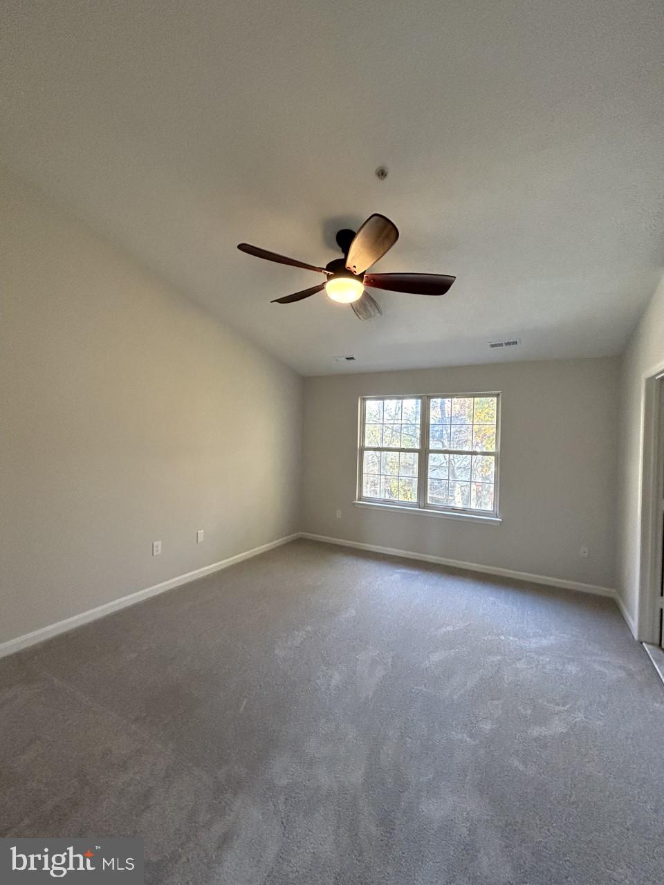 209 Quiet Ridge Court Pasadena, MD 21122 - Photo 20 of 32 Primary bedroom with cathedral ceiling