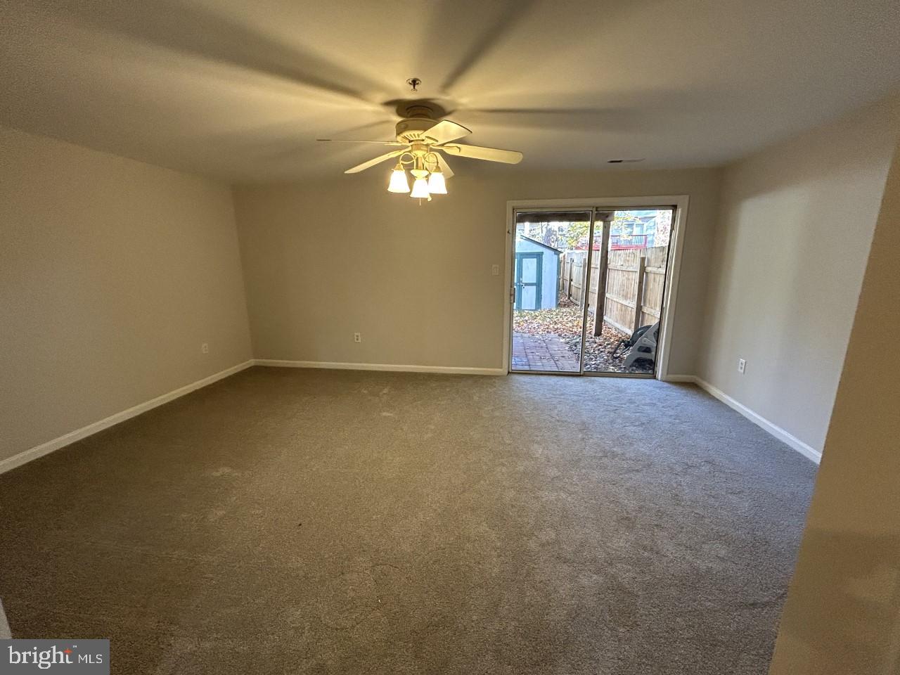 209 Quiet Ridge Court Pasadena, MD 21122 - Photo 30 of 32 Lower level family room.