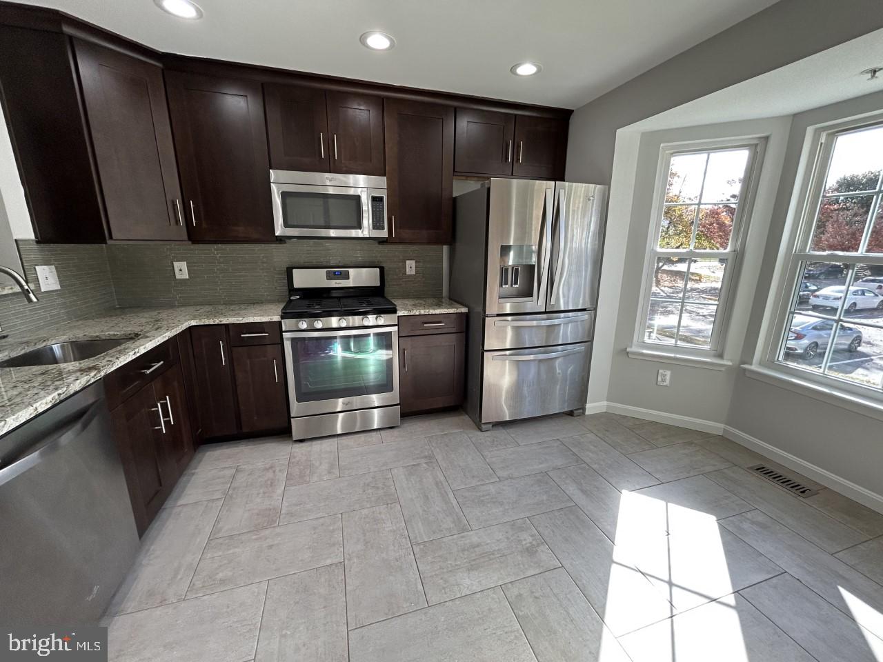 209 Quiet Ridge Court Pasadena, MD 21122 - Photo 5 of 32 Remodeled kitchen
