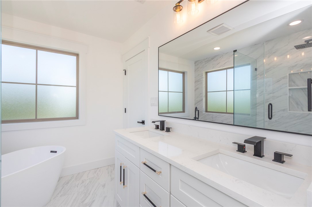 230 Hammond Circle Anderson, SC 29621 - Photo 19 of 48 This bright bathroom offers a tranquil retreat with sleek fixtures and ample natural light.