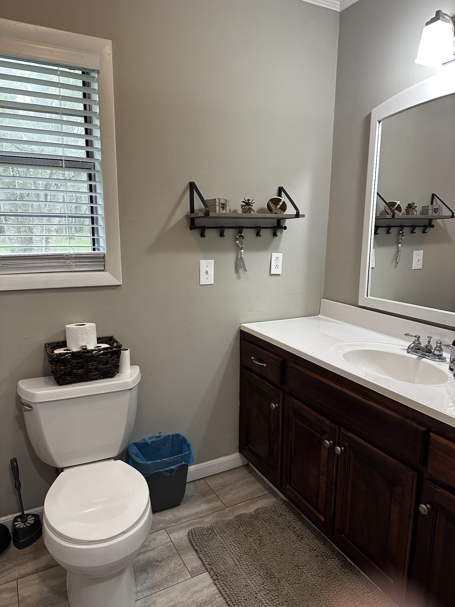 83 Hideout Road Manchester, TN 37355 - Photo 12 of 22 a bathroom with a toilet sink and mirror