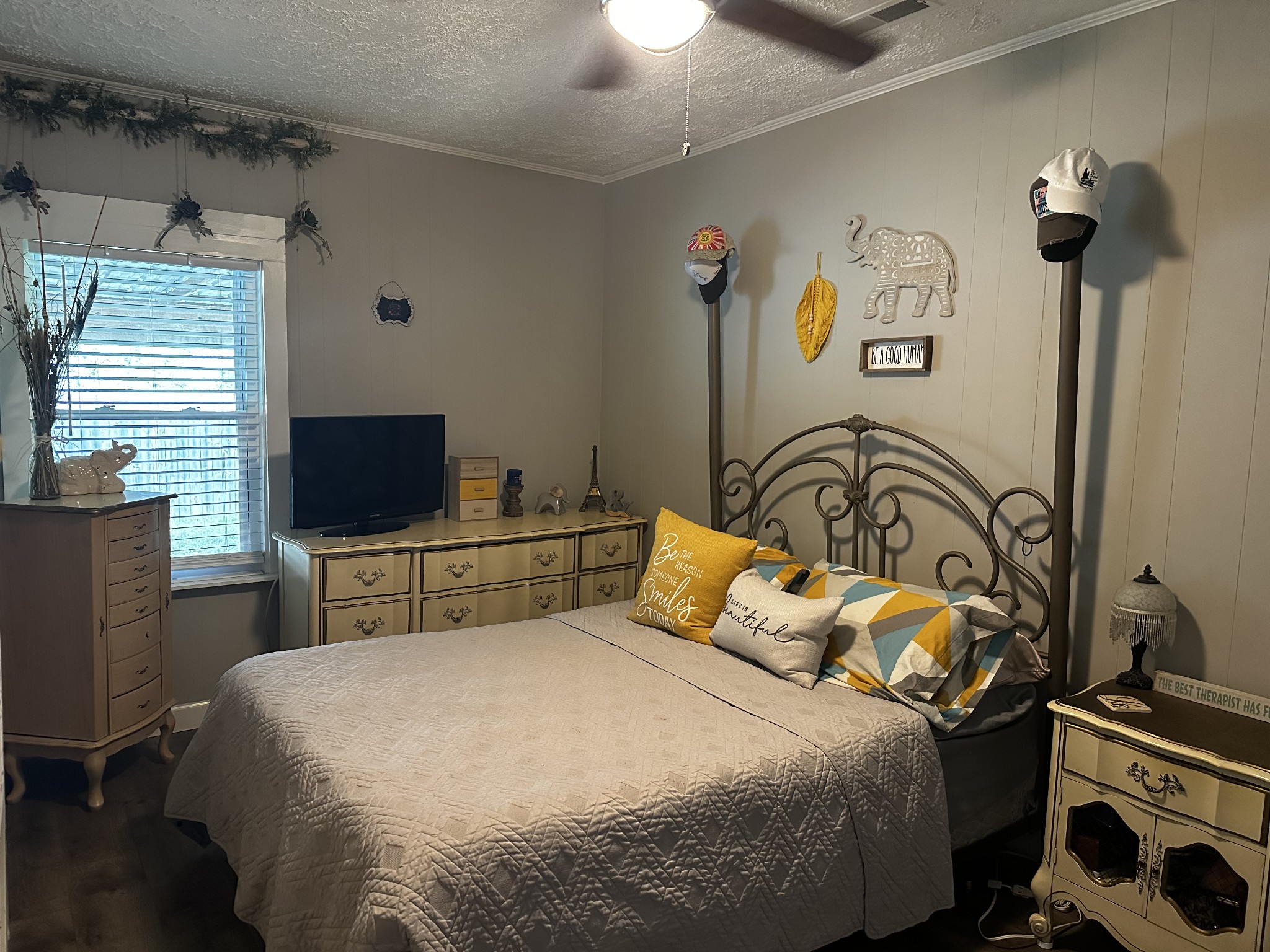 83 Hideout Road Manchester, TN 37355 - Photo 5 of 22 a bedroom with a bed and a flat tv screen on the dresser