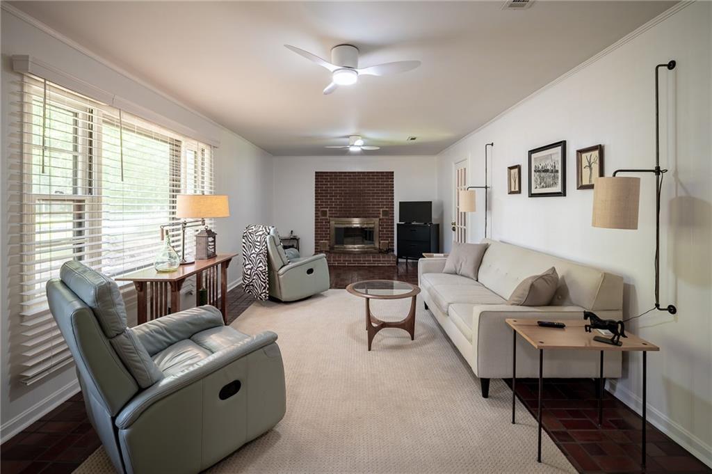 67 Dixie Park Drive Northwest Rome, GA 30165 - Photo 11 of 27 a living room with furniture and a large window