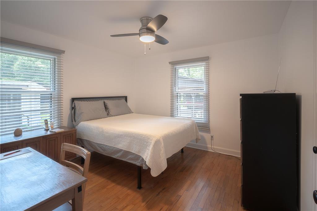 67 Dixie Park Drive Northwest Rome, GA 30165 - Photo 14 of 27 a bedroom with a bed and a table